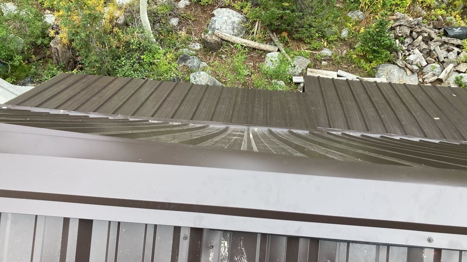 “How we Installed a New Metal Roof on a Cozy Cabin in Brighton”