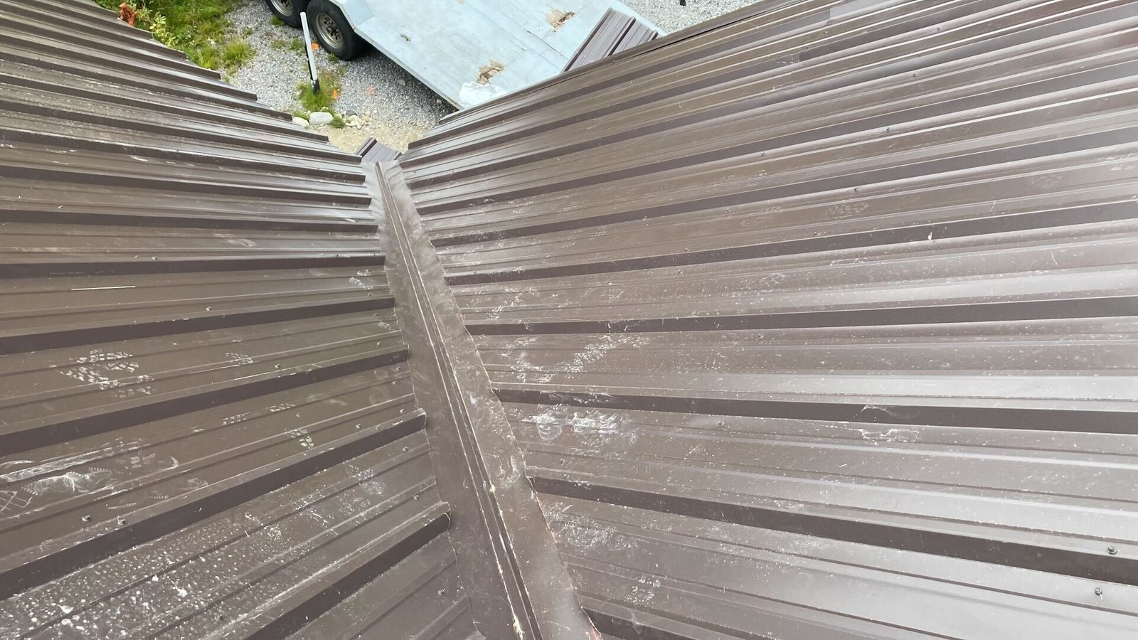 “How we Installed a New Metal Roof on a Cozy Cabin in Brighton”