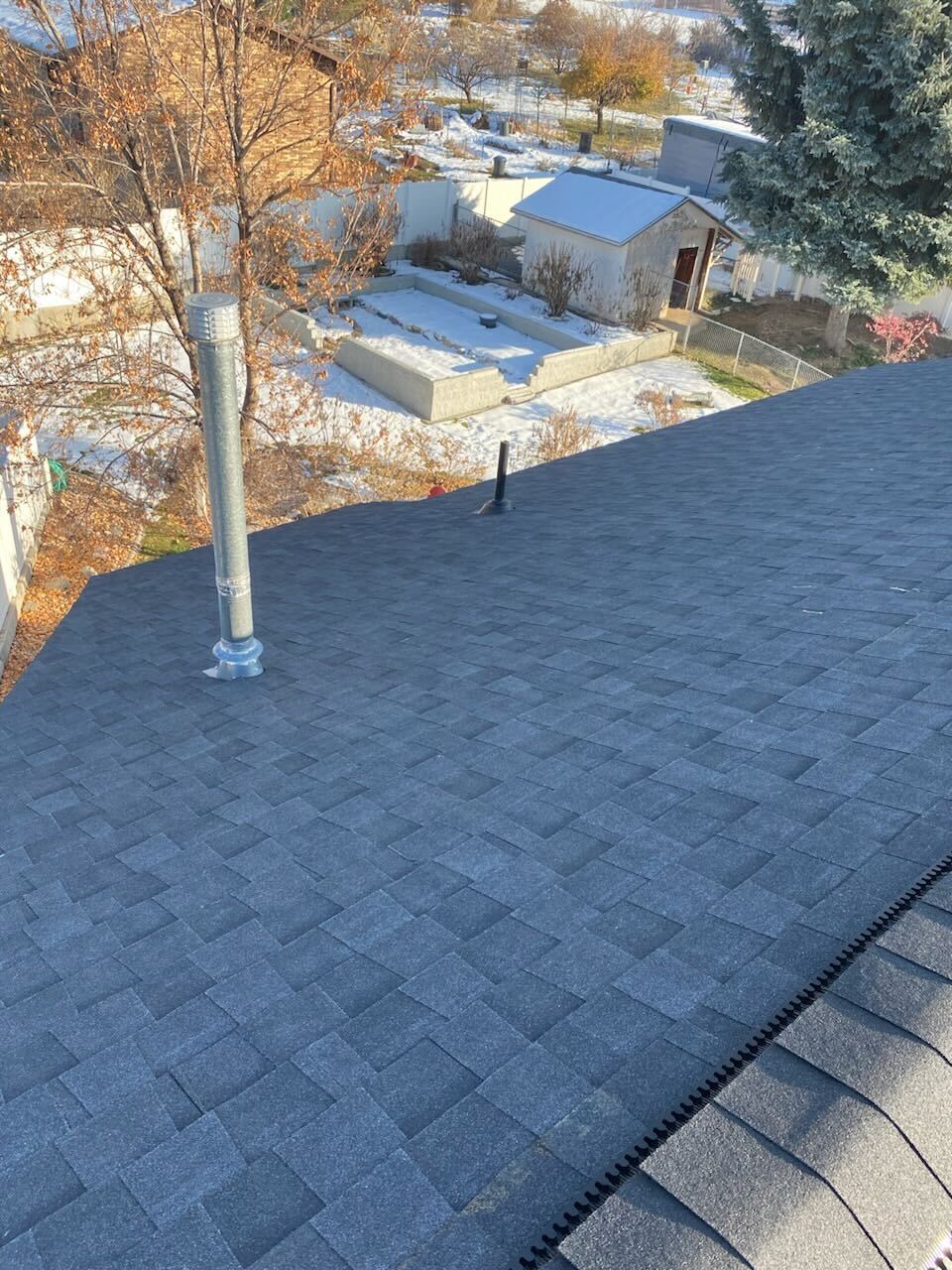 Transforming Roofs: Our Asphalt Shingle Project in Elk Ridge