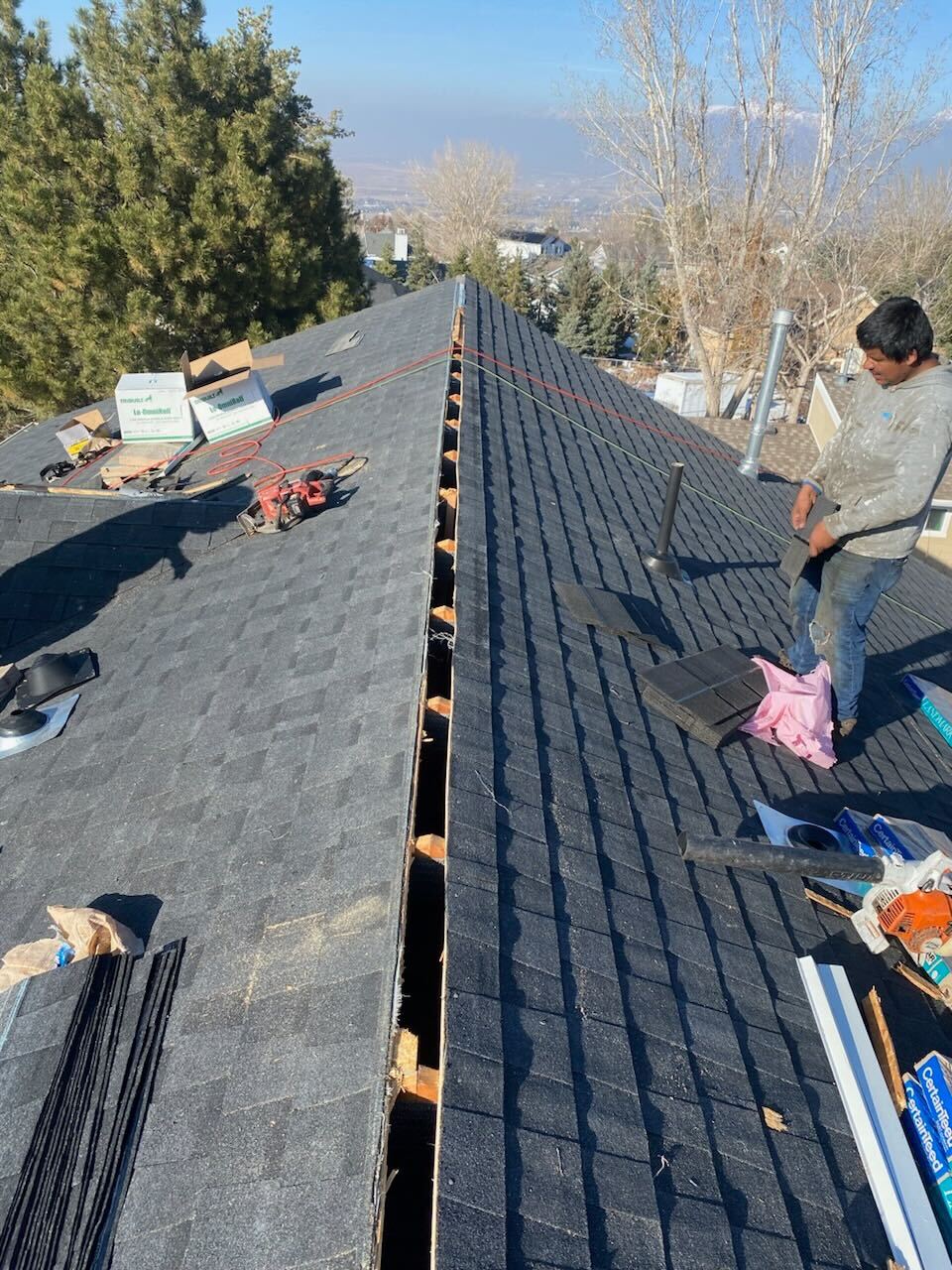 Transforming Roofs: Our Asphalt Shingle Project in Elk Ridge