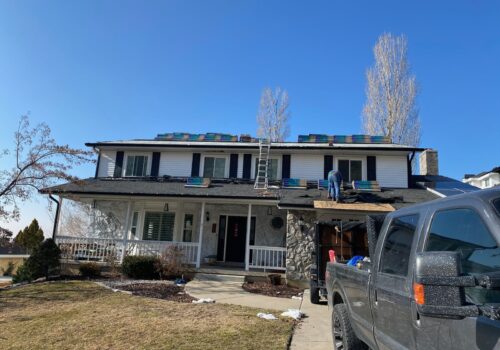 Transforming Centerville: New Porch Roof with Moire Black Shingles
