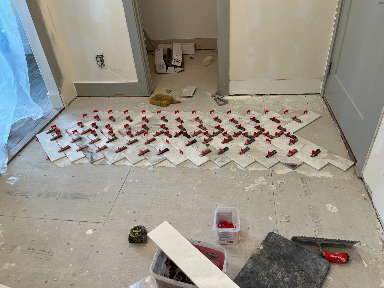 Transforming Spaces: Herringbone Tile Floor Installation in Kaysville