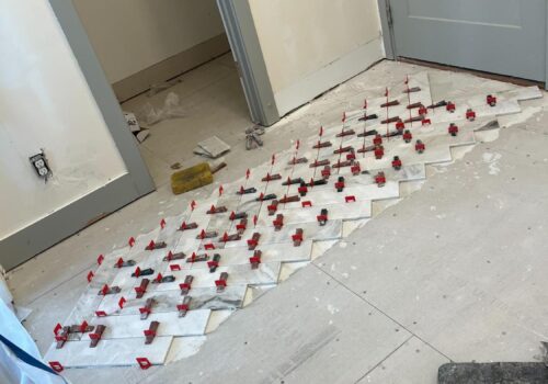 Transforming Spaces: Herringbone Tile Floor Installation in Kaysville