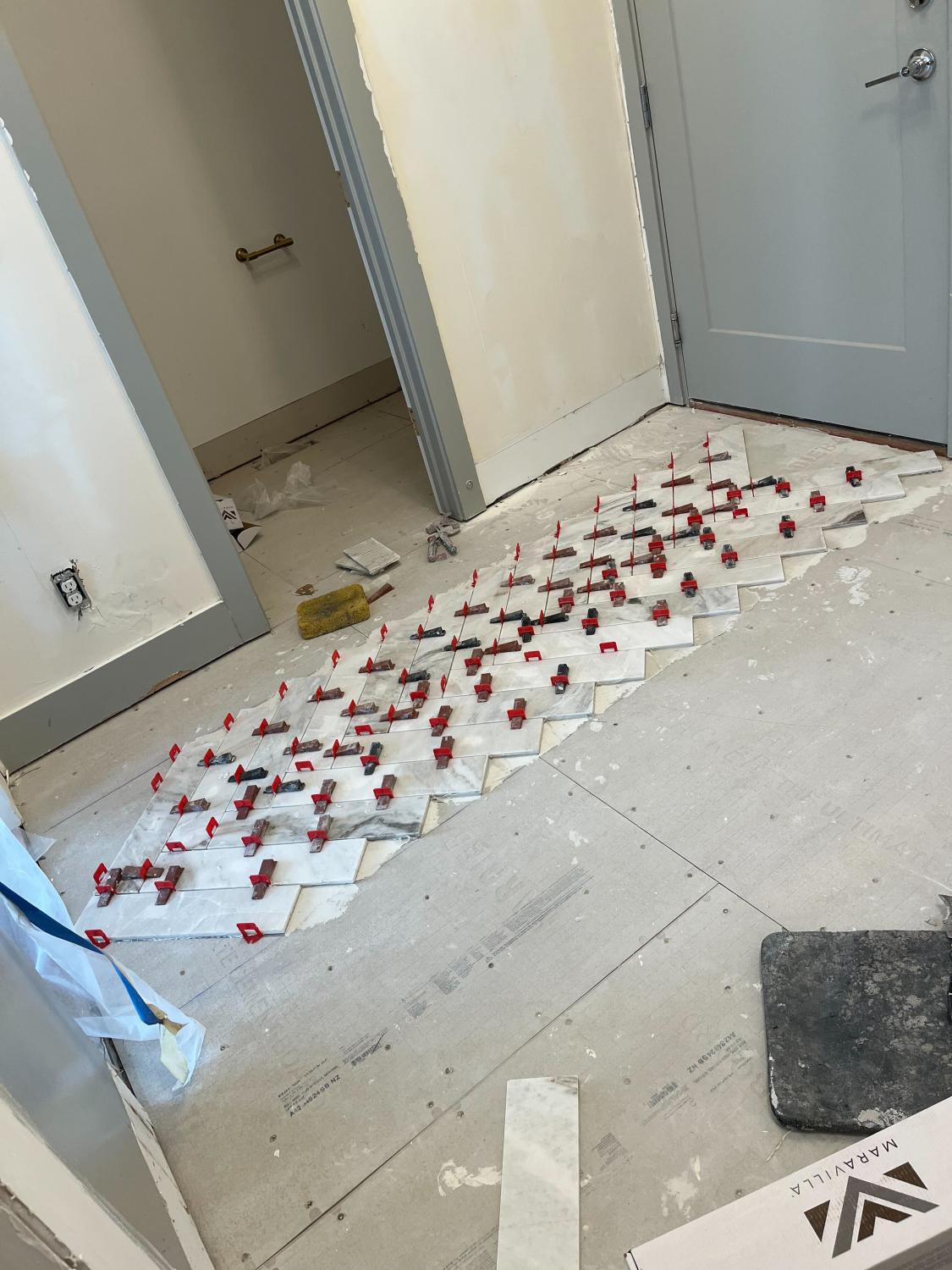 Transforming Spaces: Herringbone Tile Floor Installation in Kaysville