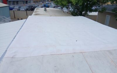 Cricket Installation Eliminates Ponding Water on Low-Slope TPO Roof – Orem, Utah