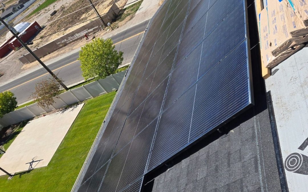 New Roof Completed in Layton, Utah – Solar Panel Removal & Reinstallation + CertainTeed Landmark Shingles in Moire Black.